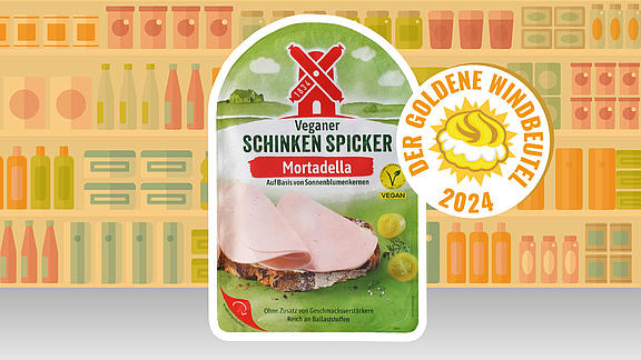 Der Schinken Spicker Vegan Mortadella von Rügenwalder Mühle auf Comic-Supermarkt-Hintergrund.